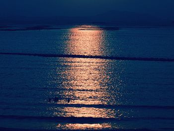 Scenic view of sea against sky at sunset