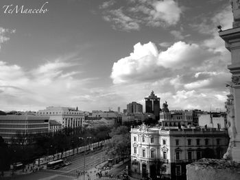 City street against cloudy sky