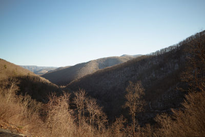 Scenic view of mountains against clear sky