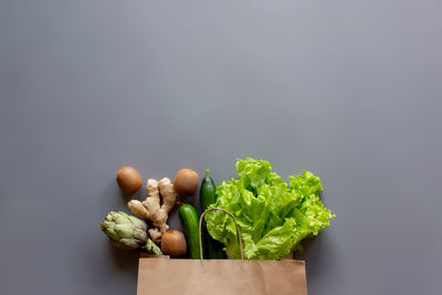 Close-up of vegetables on table against white background