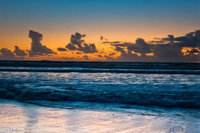 Scenic view of sea against sky during sunset