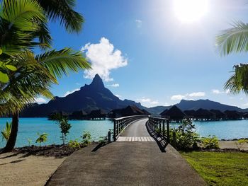 Scenic view of lake against blue sky