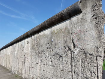 Low angle view of weathered wall