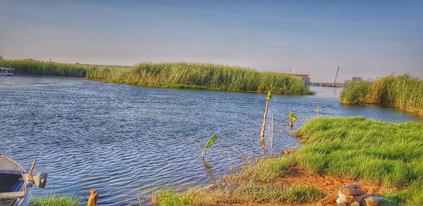 Scenic view of lake against sky