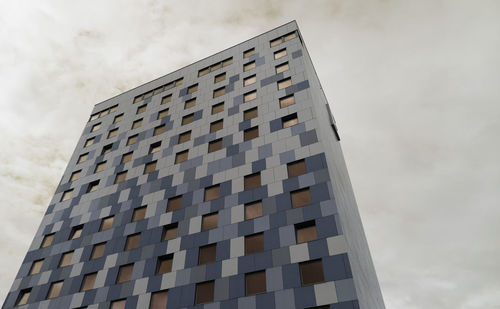 Low angle view of modern building against sky