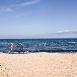 Couple walking at beach