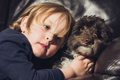 Portrait of boy with dog