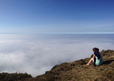 Rear view of woman looking at sea