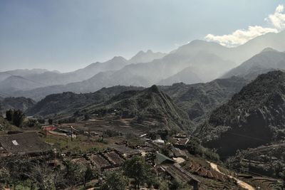 Scenic view of mountain range against sky in sapa