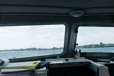 Scenic view of sea seen through window