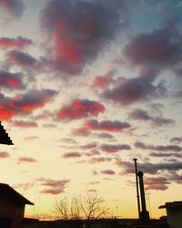 Low angle view of cloudy sky at sunset