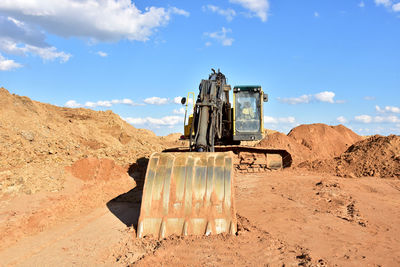 Built structure on land against sky