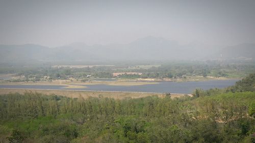 Scenic view of river against sky