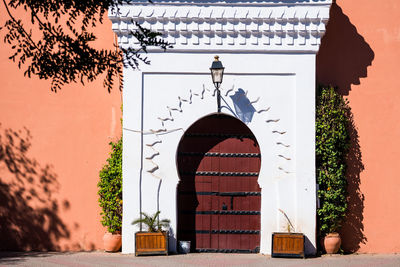 Entrance of temple against building