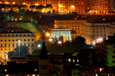 High angle view of illuminated buildings at night