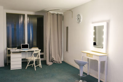 Photo studio administrator's workplace, dressing room and changing room for models