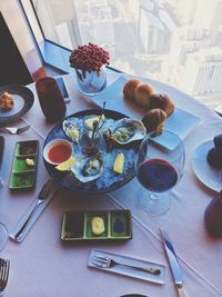 High angle view of food and drink on table at restaurant