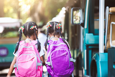 Rear view of women in bus