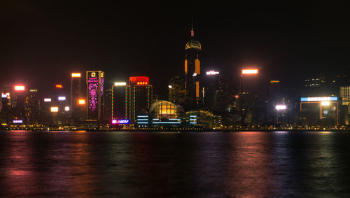 Illuminated buildings in city at night