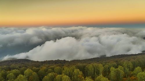 Scenic view of landscape against sky during sunset