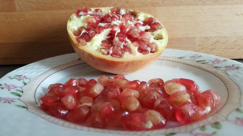 Close-up of fruits in plate on table