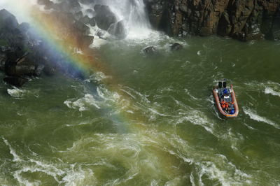 High angle view of boat sailing in river