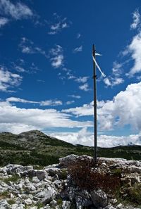 Scenic view of landscape against blue sky