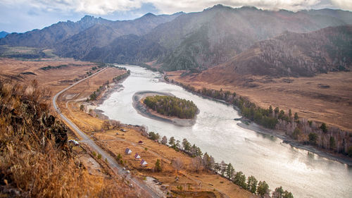 Autumn scenery of the altai mountain chemal region high mountains, a mountain river 