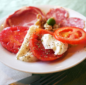 Close-up of strawberry slices in plate on table
