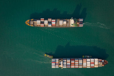 Aerial top view from drone, container ship or cargo shipping business logistic import and export 