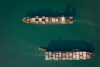 High angle view of container ship in sea