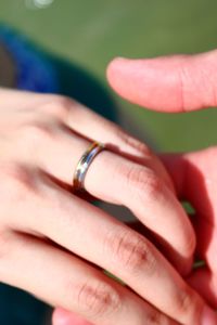 Close-up of couple holding hands