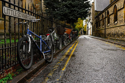 Bicycle parked on street in city