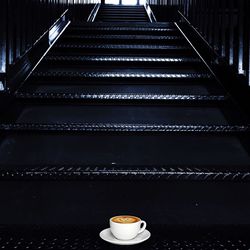 Cup of cappuccino on steps