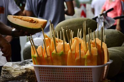 Close-up of man preparing food