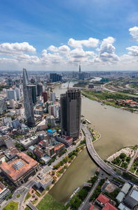 High angle view of buildings in city against sky