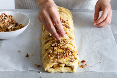 Midsection of man preparing food