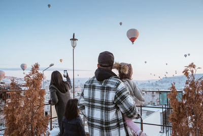 Low angle view of hot air balloons against sky