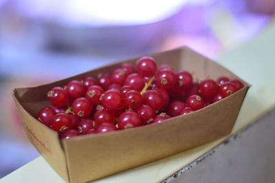 High angle view of strawberries in container on table