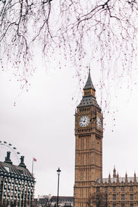 Low angle view of clock tower against sky