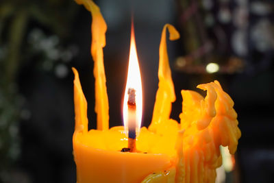 Close-up of burning candle