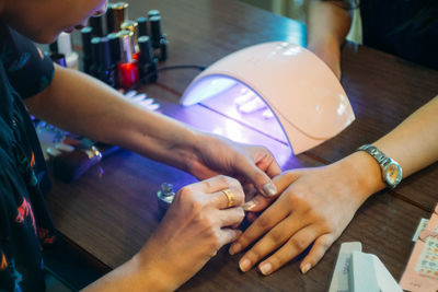 High angle view of people on table