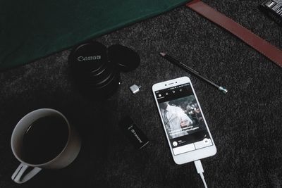 High angle view of coffee cup on table