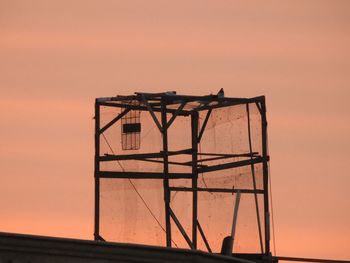 Bird cage on top of a building