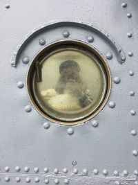 Close-up of water drops on metal