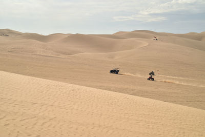 Vehicle moving on desert