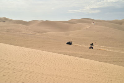 Scenic view of desert against sky