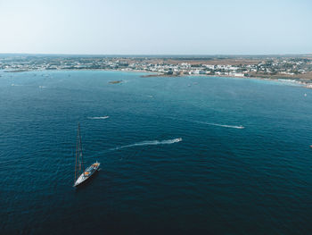 High angle view of sailboat in sea against sky