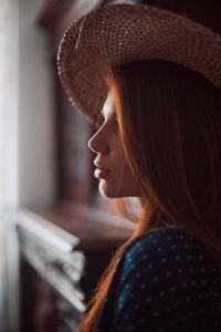 Portrait of a young woman in hat