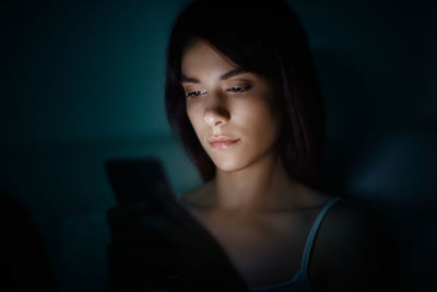 Young woman using smart phone